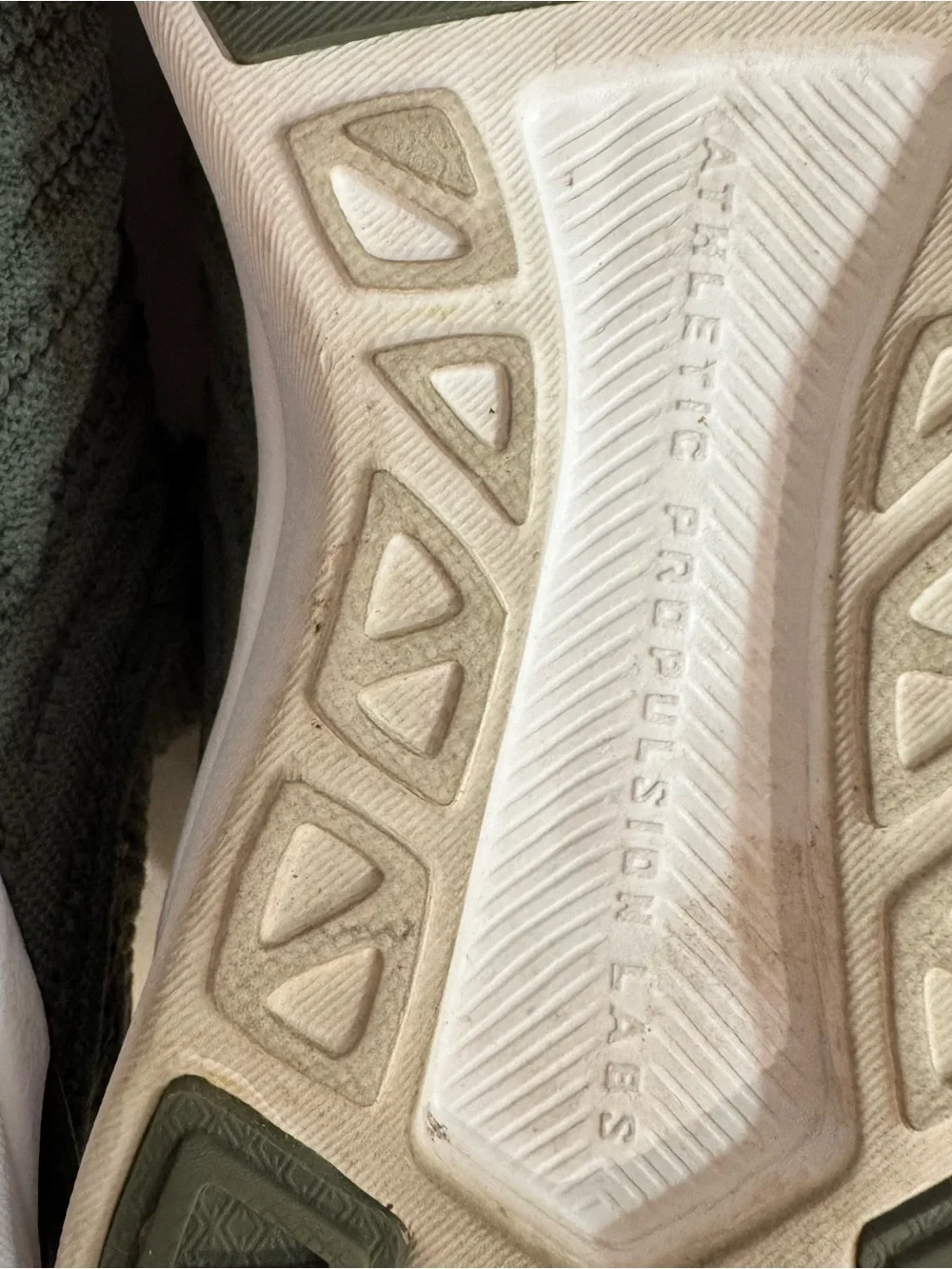 APL women’s TechLoom Knit Sneakers in Olive green